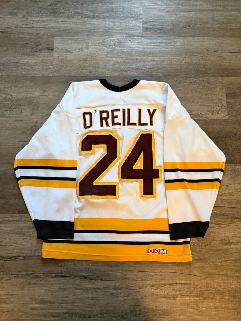 CCM White Hockey Jersey with Gold and Maroon Accents